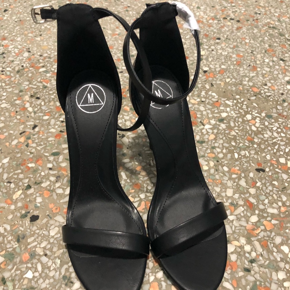 Perfect sexy black heels! Never worn, in box.